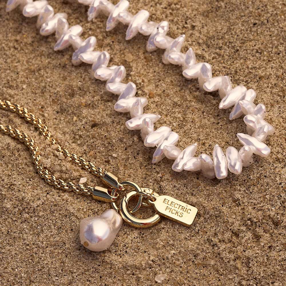 Coral Pearl Clam Charm — Phone Wristlet - US 66543
